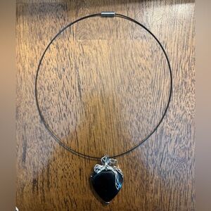 Black stone with silver tone wrapping heart shape stone with black choker